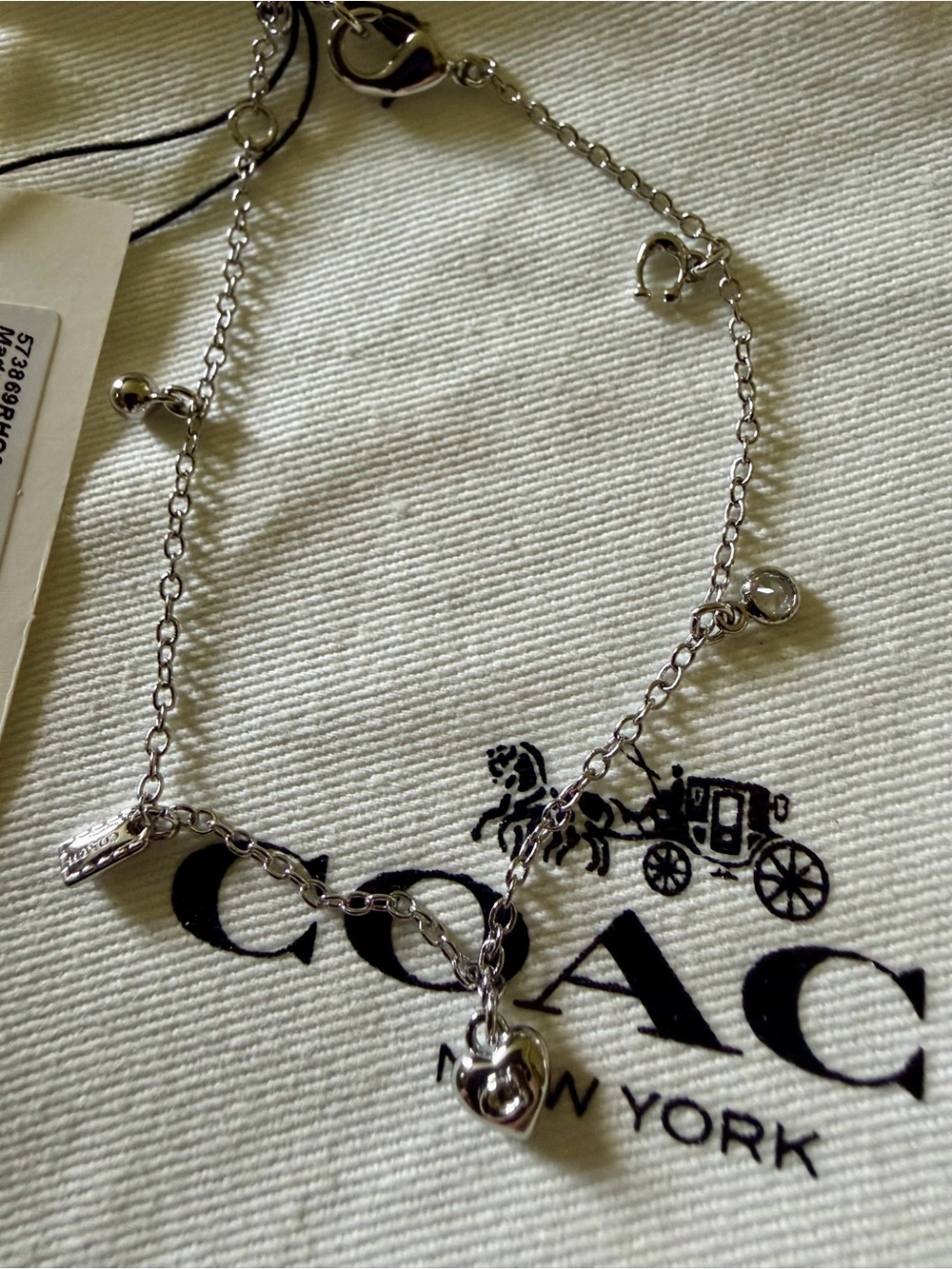 Coach Silver Heart & Charm Chain Bracelet